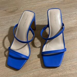 Blue strappy heels